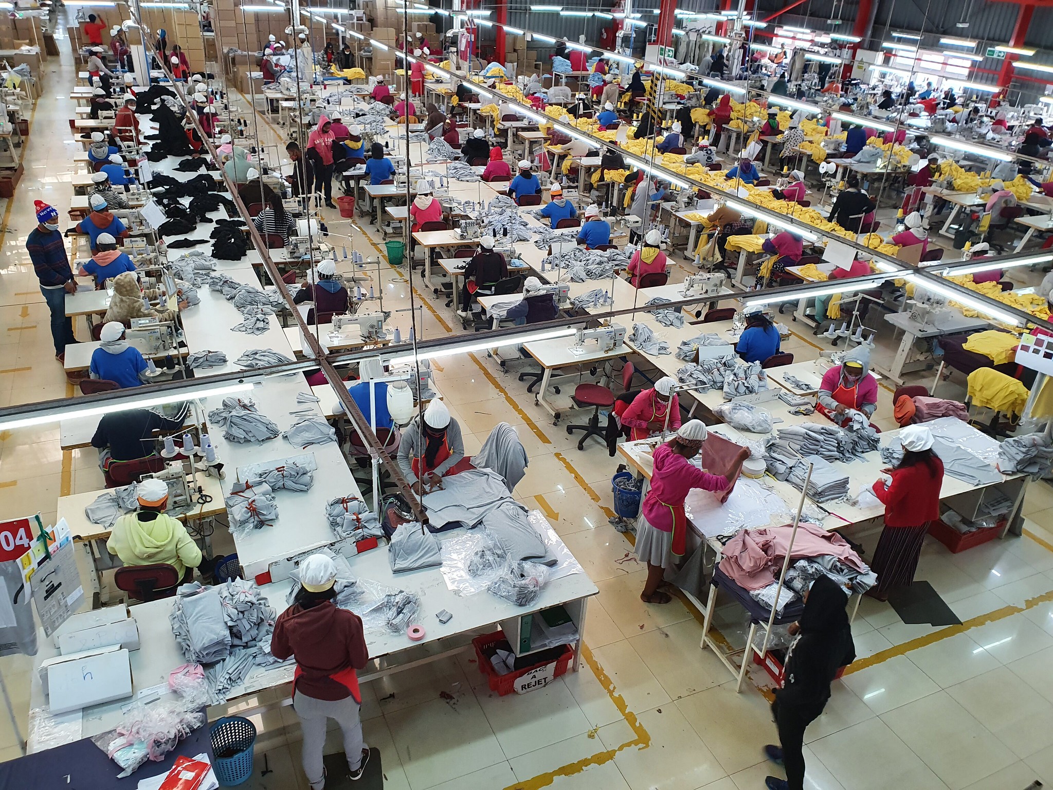 Decorative image of textile workers in a free zone in Antananarivo, Madagascar. ILO Photo.  